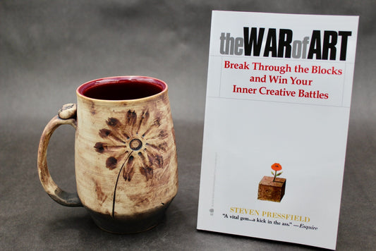 One "War of Art" Mug and One Autographed Book, "The War of Art" by Steven Pressfield (SK7783)